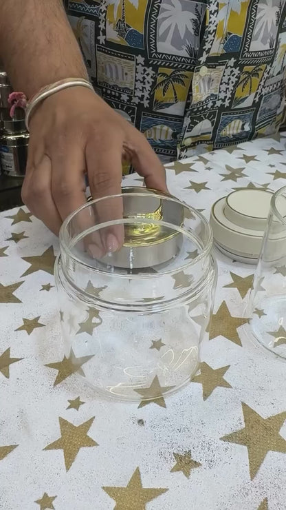Delightful golden-steel-glass dry fruit tray set.