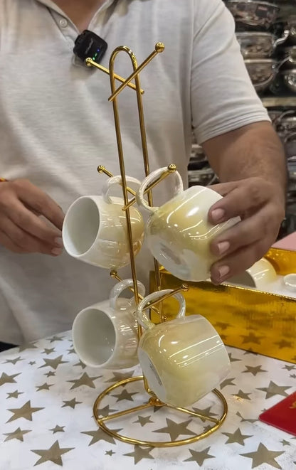 Addox ceramic cup set in gradient colour with golden PVD coated cup stand