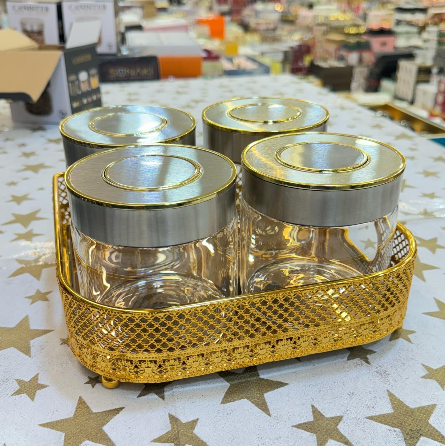 Delightful golden-steel-glass dry fruit tray set.