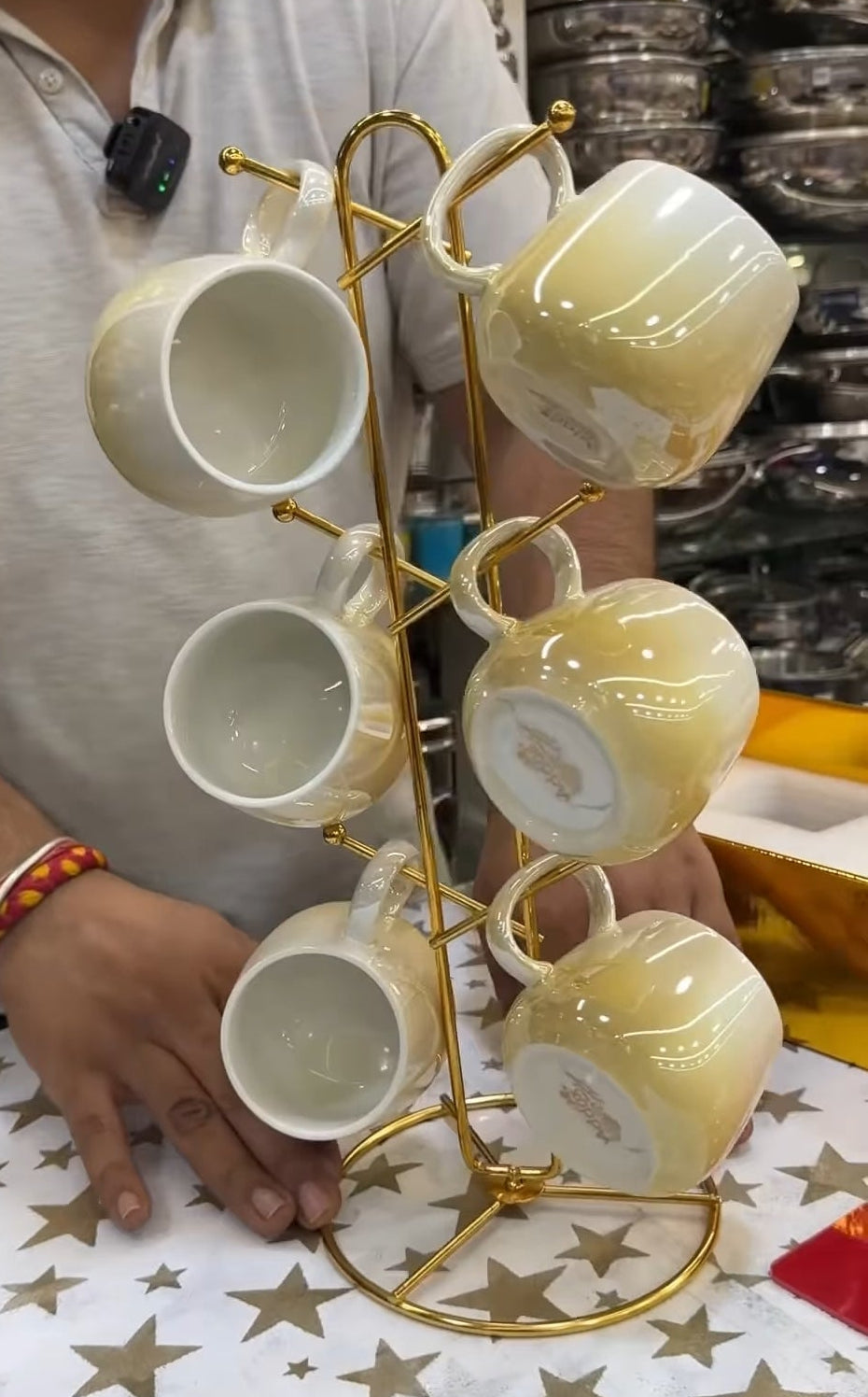 Addox ceramic cup set in gradient colour with golden PVD coated cup stand